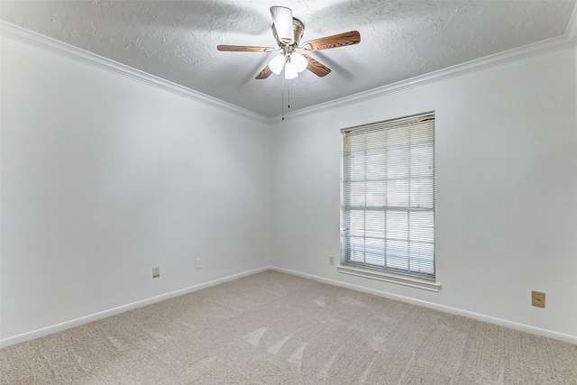 carpeted empty room featuring crown molding, a textured ceiling, and ceiling fan