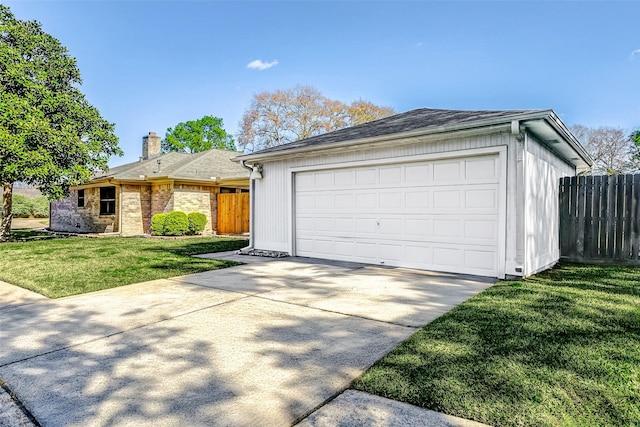 ranch-style house with a garage and a front yard