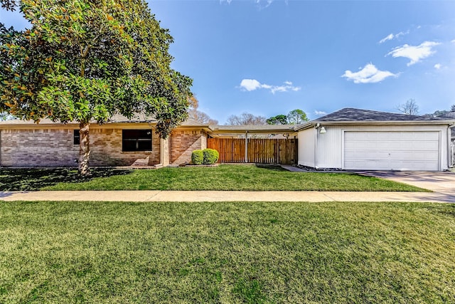 ranch-style home with a garage and a front yard