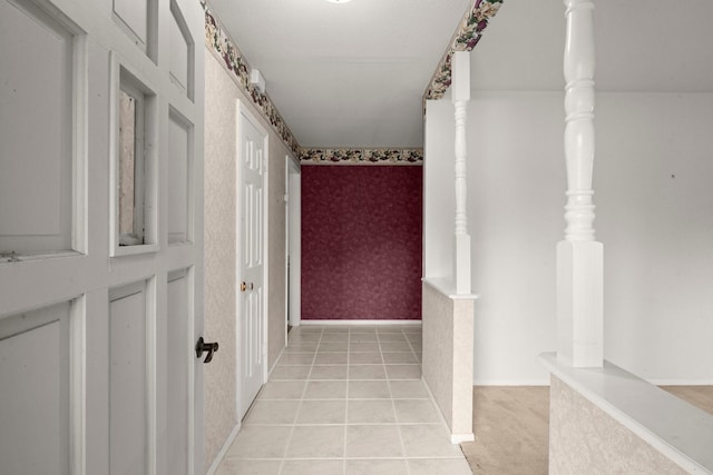 hallway with light tile patterned floors