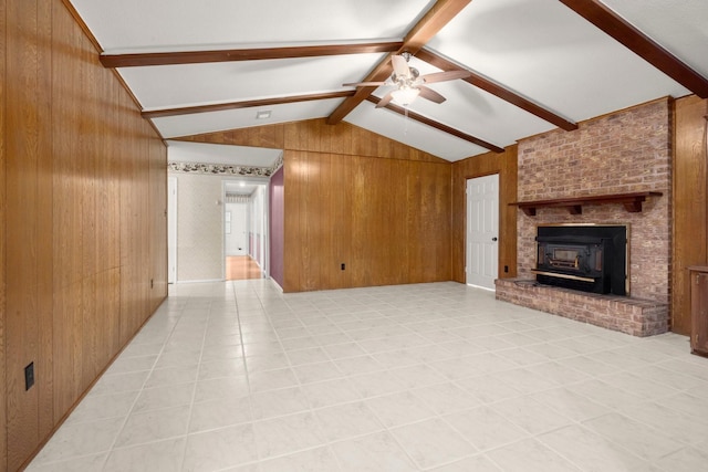 unfurnished living room with light tile patterned floors, lofted ceiling with beams, ceiling fan, and wood walls