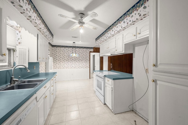 kitchen with pendant lighting, white cabinetry, sink, ceiling fan, and white appliances