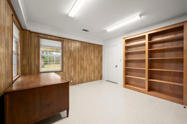 office area with wood walls