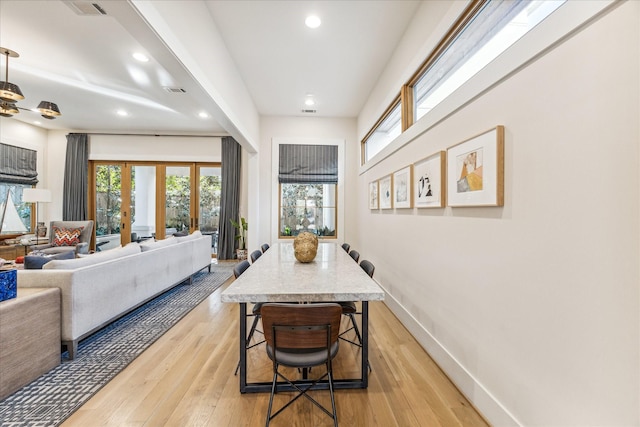 dining room featuring light hardwood / wood-style floors