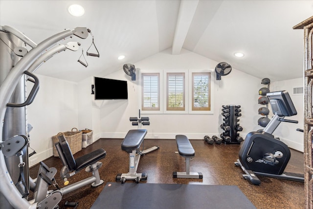 workout room featuring lofted ceiling