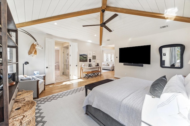 bedroom with wood ceiling, lofted ceiling with beams, multiple windows, and light wood-type flooring