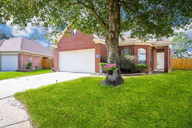 view of front of property with a garage and a front yard