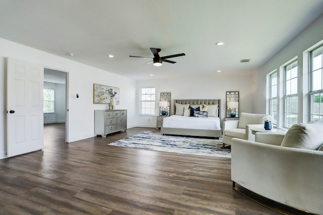 bedroom featuring ceiling fan and dark hardwood / wood-style floors