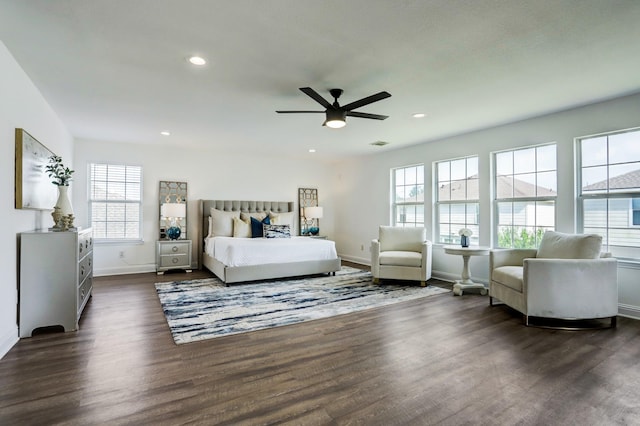 bedroom featuring dark hardwood / wood-style floors and ceiling fan