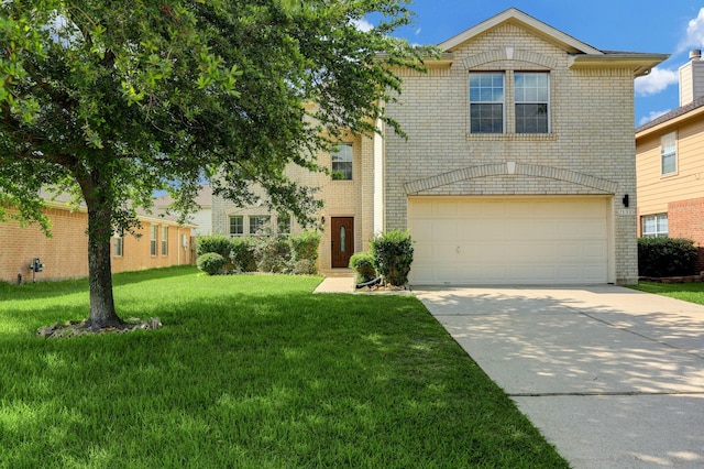 view of front facade with a garage and a front yard