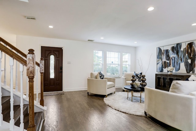 living room with dark wood-type flooring