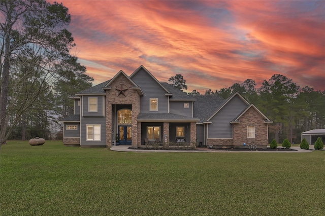 craftsman inspired home with a lawn