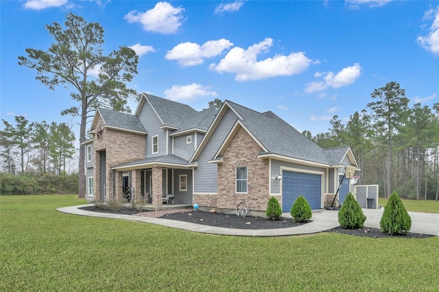 view of front of home featuring a garage and a front lawn