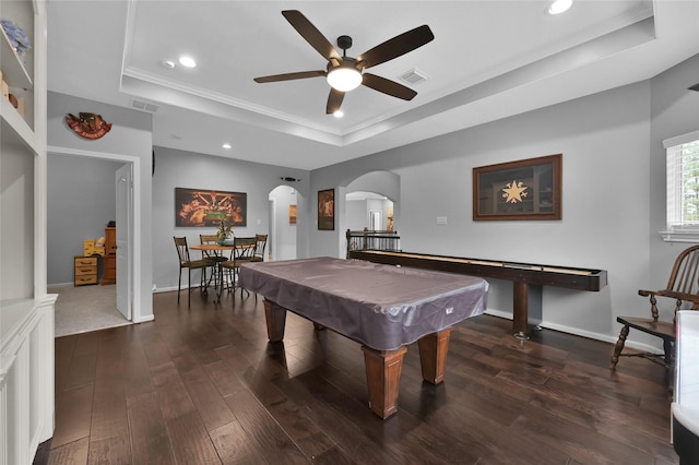 playroom featuring ceiling fan, pool table, dark hardwood / wood-style flooring, and a tray ceiling