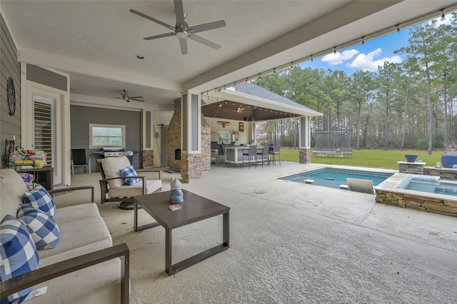 exterior space with a swimming pool with hot tub, an outdoor hangout area, a bar, and ceiling fan