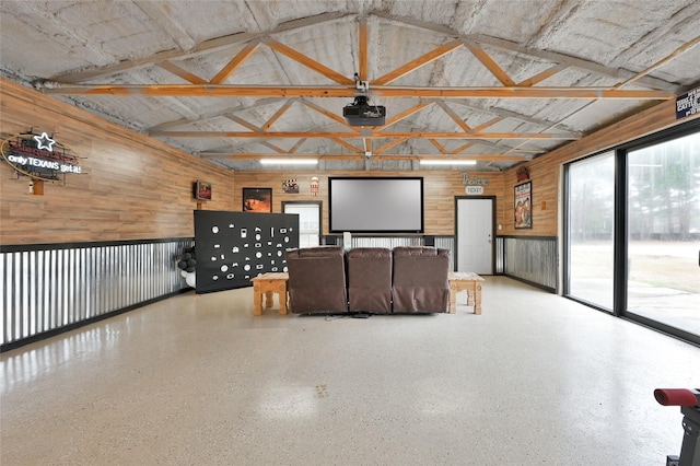 home theater featuring lofted ceiling