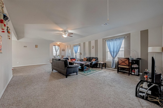 carpeted living room featuring ceiling fan