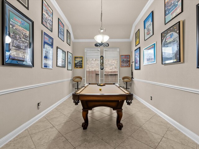 recreation room with lofted ceiling, pool table, ornamental molding, and light tile patterned flooring