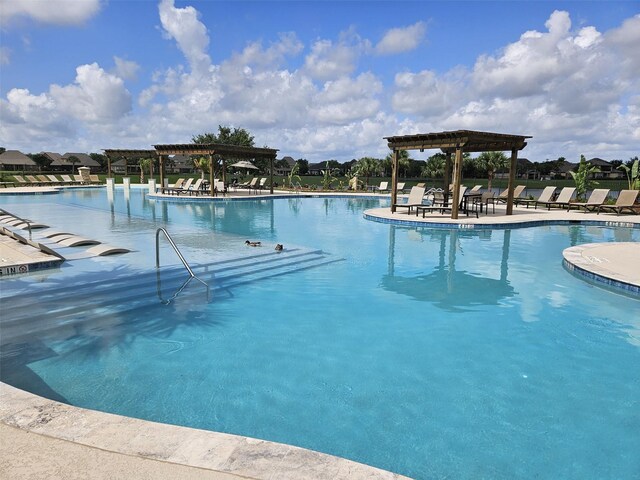 view of pool featuring a pergola