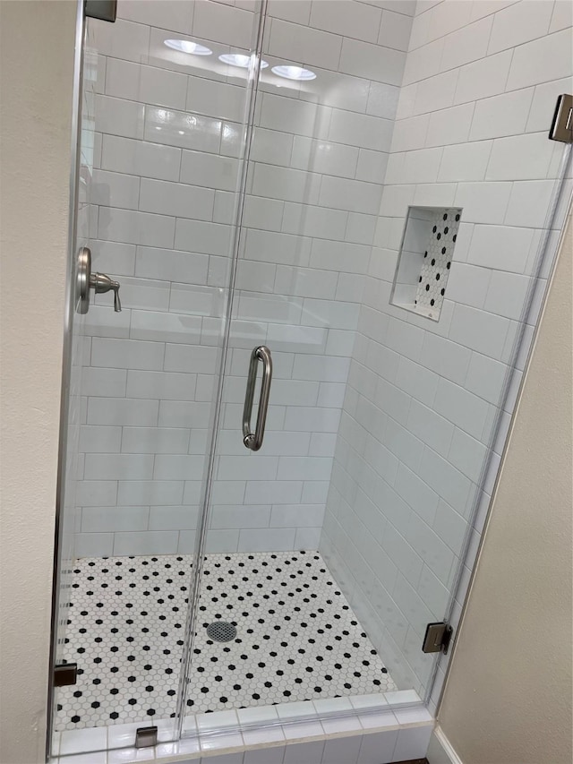 bathroom featuring walk in shower