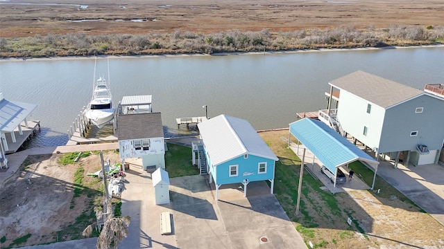 bird's eye view with a water view