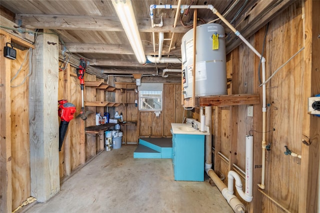 interior space featuring sink and wood walls