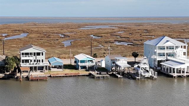 drone / aerial view featuring a water view