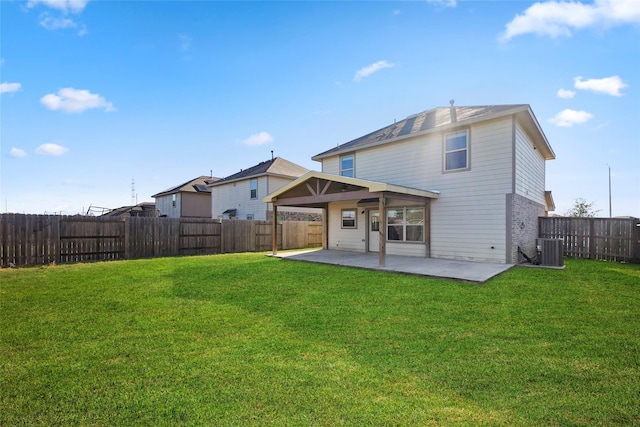 back of property featuring cooling unit, a patio, and a lawn