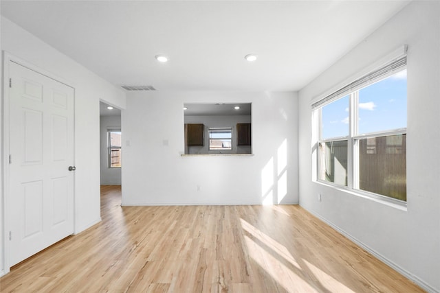 unfurnished living room featuring light hardwood / wood-style flooring