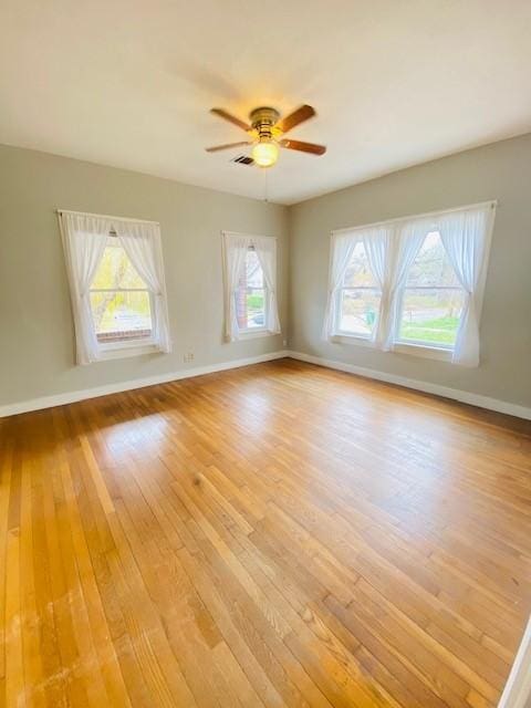 interior space featuring ceiling fan and light hardwood / wood-style flooring