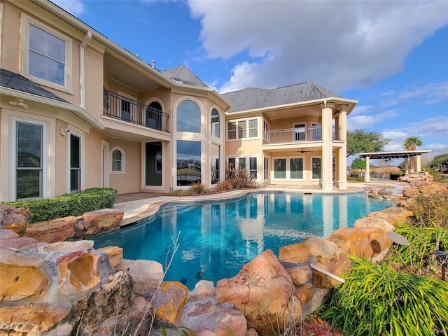 view of pool with a patio area and a pergola