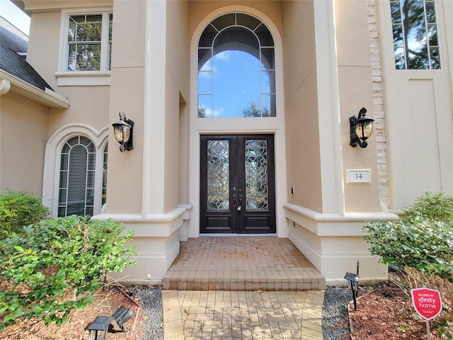 doorway to property featuring french doors