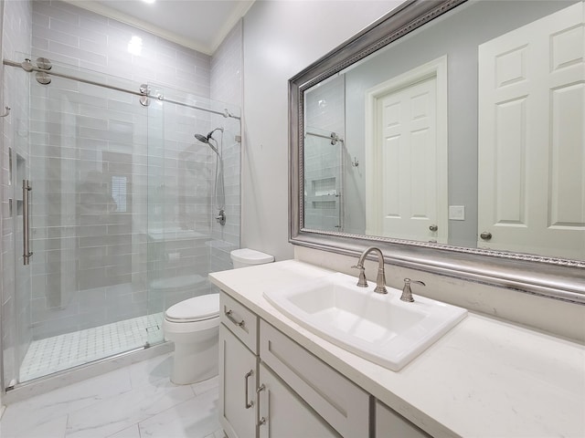 bathroom with vanity, toilet, and an enclosed shower