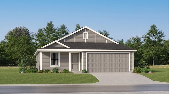 view of front of house featuring a garage and a front lawn