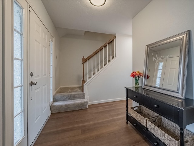 foyer featuring dark hardwood / wood-style flooring