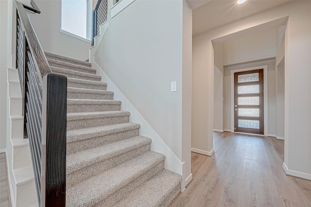 entryway with light hardwood / wood-style flooring