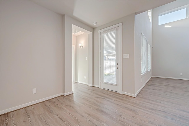 entrance foyer with light hardwood / wood-style flooring