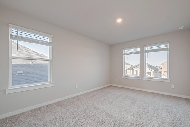 view of carpeted spare room