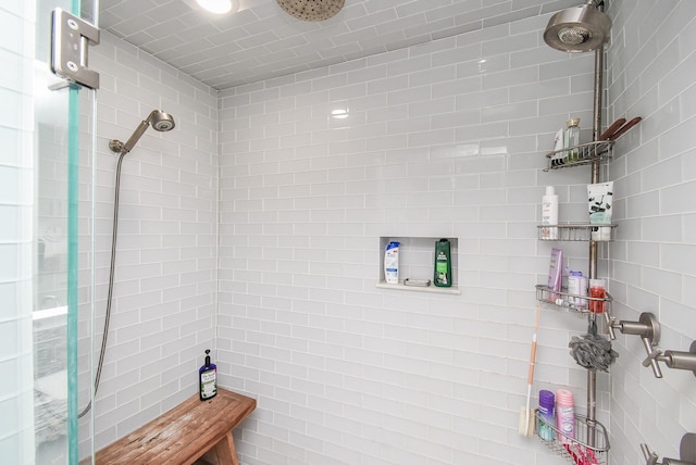 bathroom featuring tiled shower