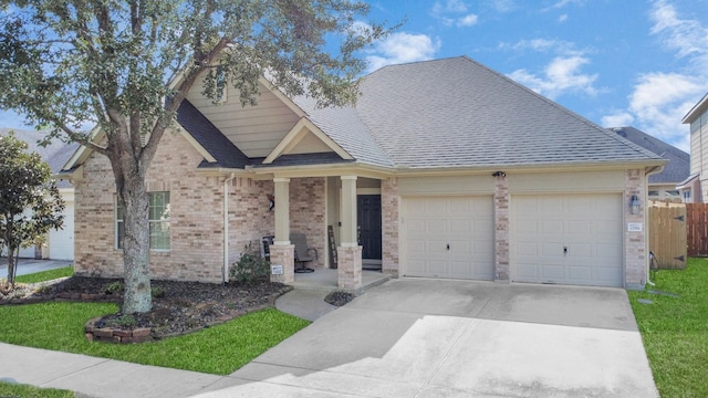 craftsman house with a garage