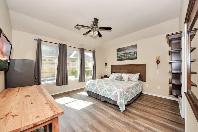 bedroom featuring hardwood / wood-style flooring and ceiling fan