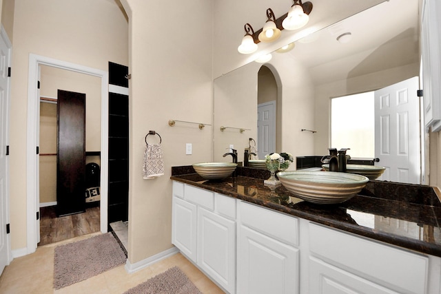 bathroom with vanity and tile patterned floors