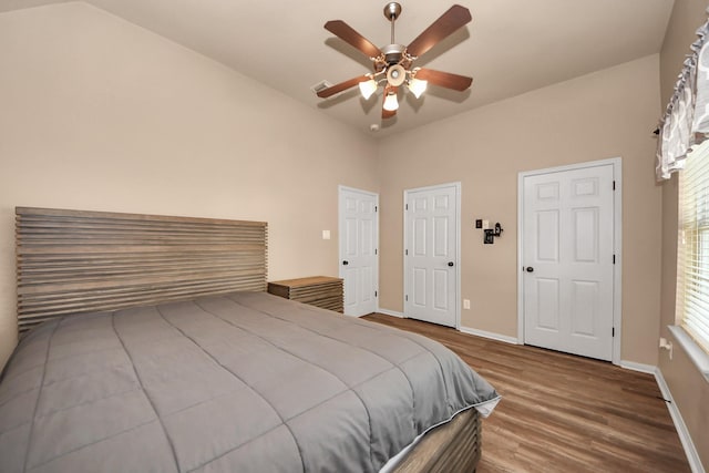 bedroom with hardwood / wood-style flooring and ceiling fan