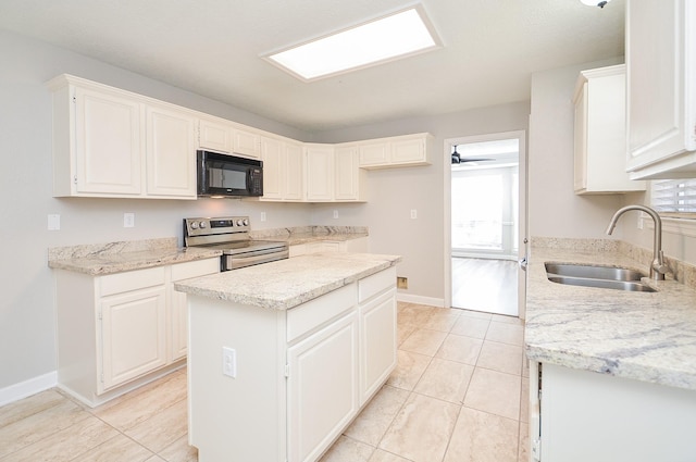 kitchen with white cabinets, electric stove, ceiling fan, black microwave, and a sink