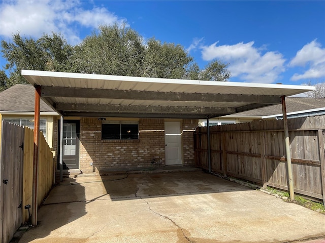 exterior space with a carport