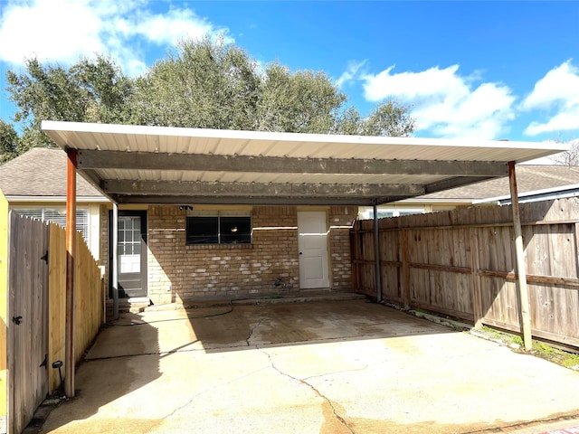 view of patio / terrace featuring a carport