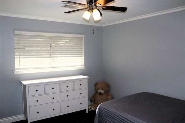 bedroom with crown molding and ceiling fan