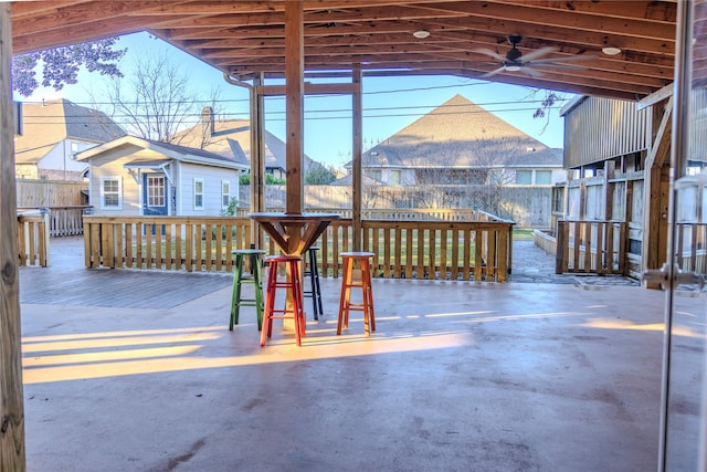 view of patio / terrace with an outbuilding and ceiling fan