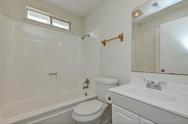 full bathroom featuring vanity, bathing tub / shower combination, and toilet