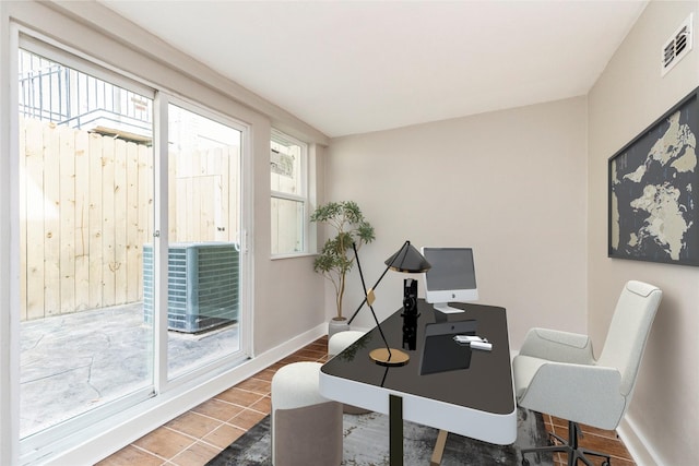 office space with hardwood / wood-style floors